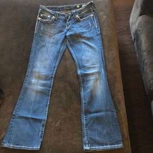 Miss Me. Boot cut. Stretchy. Blue jeans